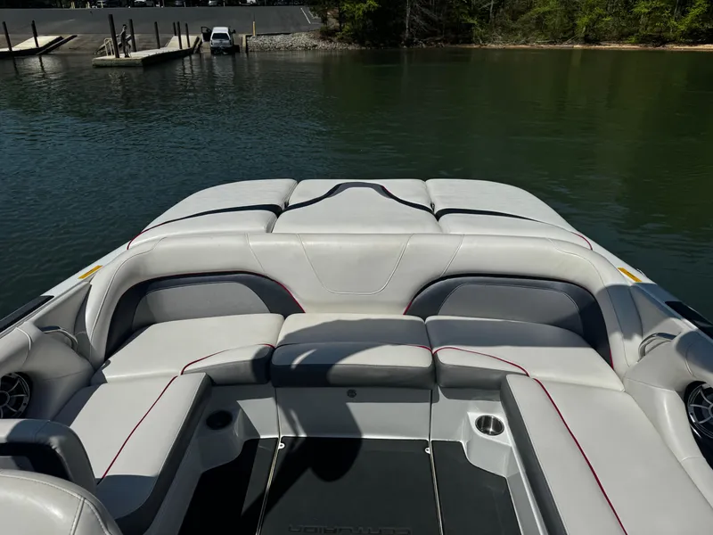 Slide: The Image of 2012 Centurion Enzo SV230 boat interior with gray seating and lake view. - 17