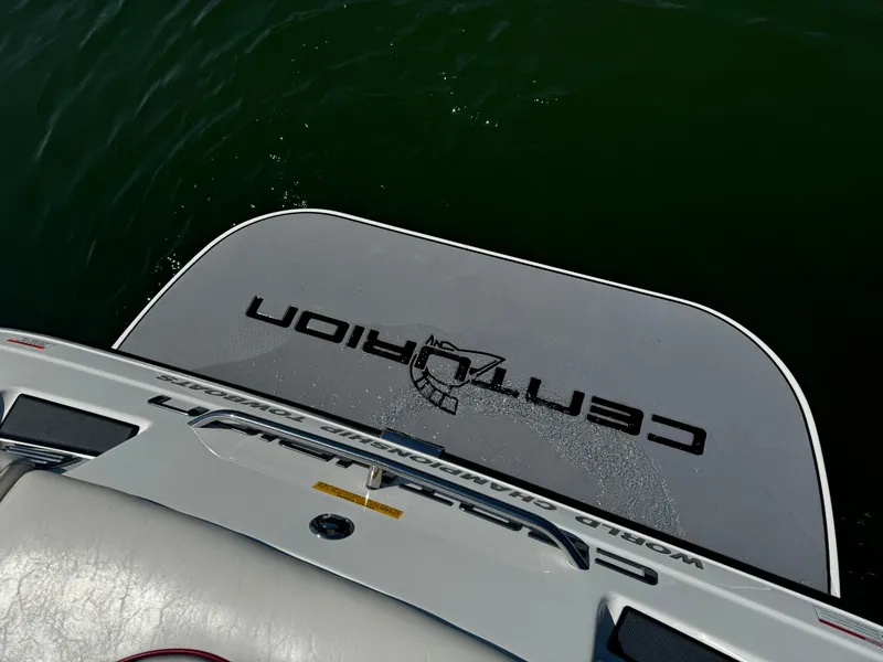 Slide: The Image of 2012 Centurion Enzo SV230 boat swim platform on water. - 18