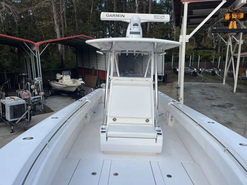 Slide: The Image of 2016 Contender 35 ST boat with Garmin radar, docked in a marina. - 13