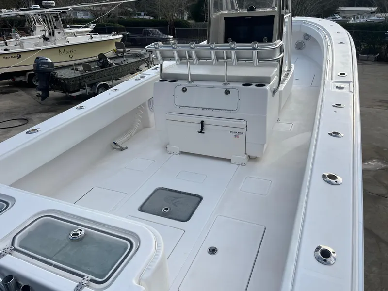 Slide: The Image of 2016 Contender 35 ST boat deck with storage compartments and seating. - 3