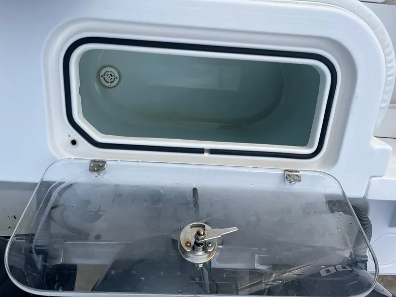 Slide: The Image of Livewell compartment on a 2016 Contender 35 ST boat with a transparent lid. - 9