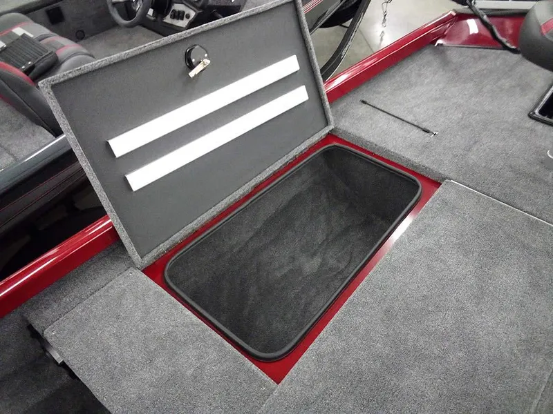 Slide: The Image of 2025 Ranger RT188C boat storage compartment with open lid, showcasing spacious interior. - 12