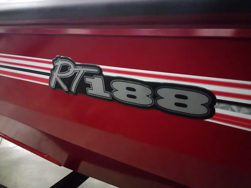 Slide: The Image of Red 2025 Ranger RT188C boat with bold RT188 logo and white stripes. - 2