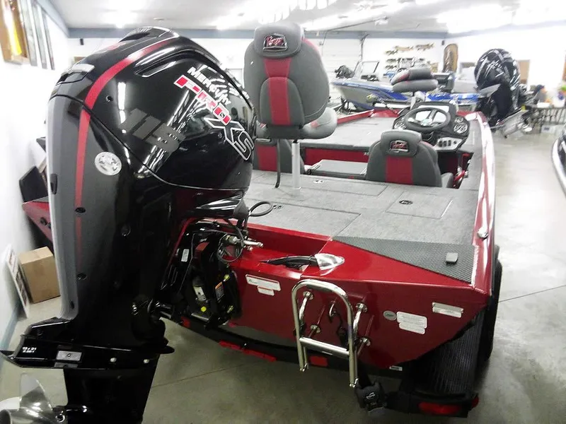 Slide: The Image of 2025 Ranger RT188C boat with powerful outboard motor in showroom. - 8