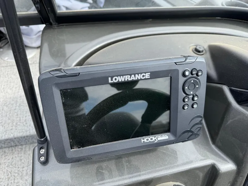 Slide: The Image of Lowrance Hook fish finder on 2021 Tracker Targa V-18 Combo boat dashboard. - 11