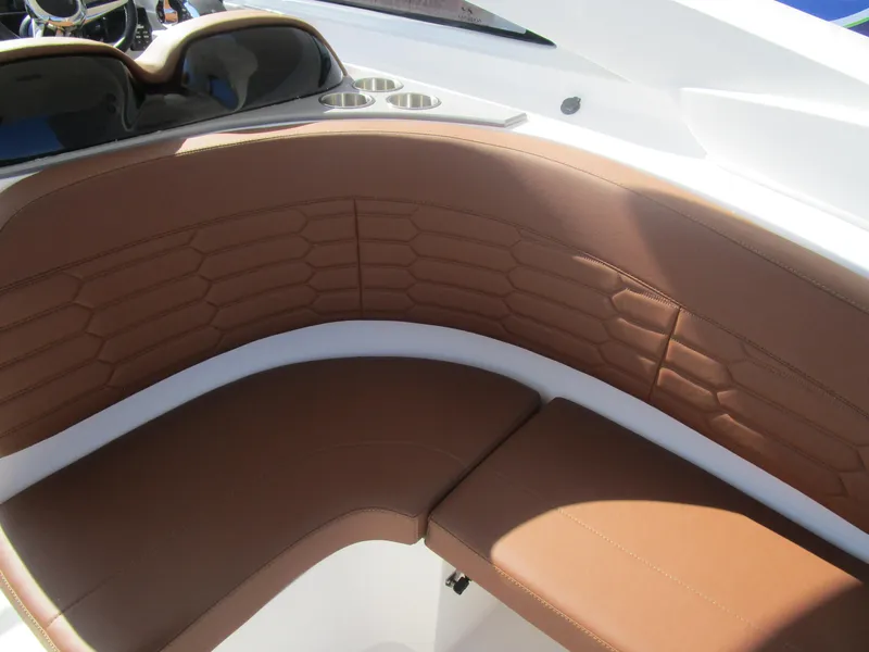 Slide: The Image of Luxurious brown seating on 2025 NX Boats 290, featuring modern design and comfort. - 10