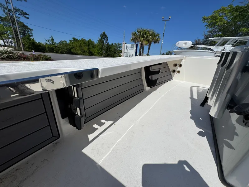 Slide: The Image of 2024 Hewes Redfisher 16 boat interior with storage compartments and sleek design. - 28