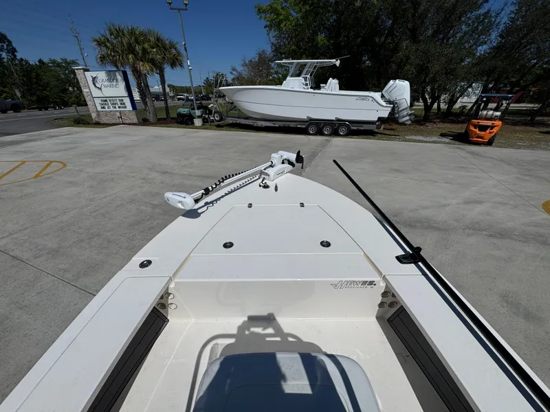 Slide: The Image of 2024 Hewes Redfisher 16 boat on display, featuring a sleek design and modern equipment. - 30