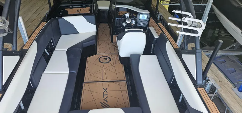 Slide: The Image of 2020 ATX Surf Boats 24 Type-S interior with sleek seating and modern dashboard. - 8