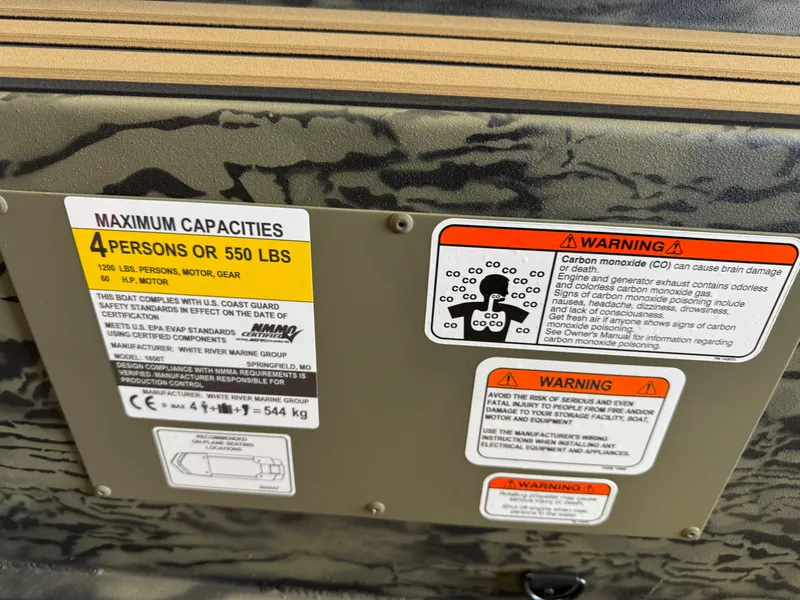 Slide: The Image of Safety warning labels on 2025 Tracker Grizzly 1650 T Prairie Wings Edition boat. - 10