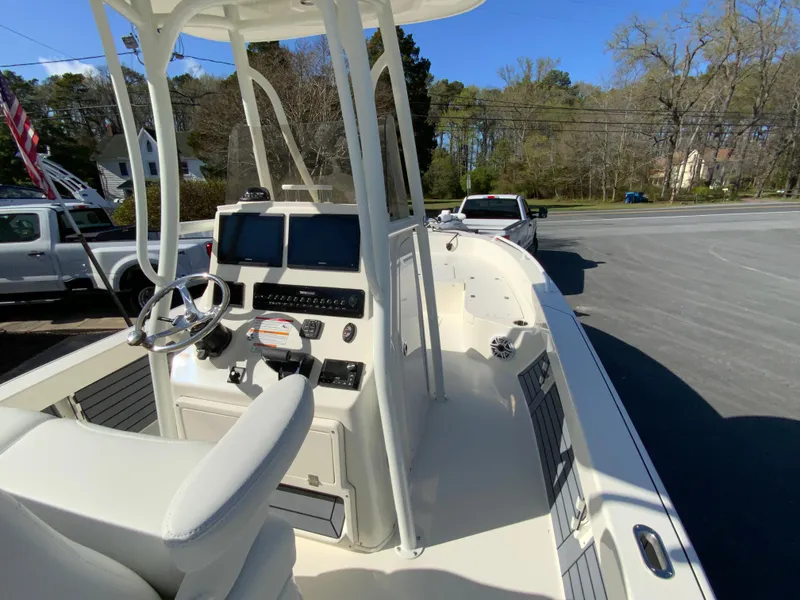 Slide: The Image of 2025 Pathfinder 2600 TRS boat interior with modern console and seating. - 21