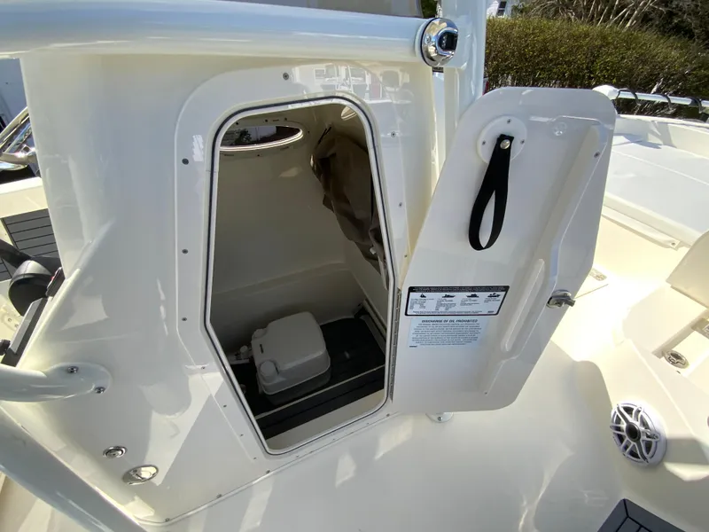 Slide: The Image of 2025 Pathfinder 2600 TRS boat with open cabin door showing interior. - 32