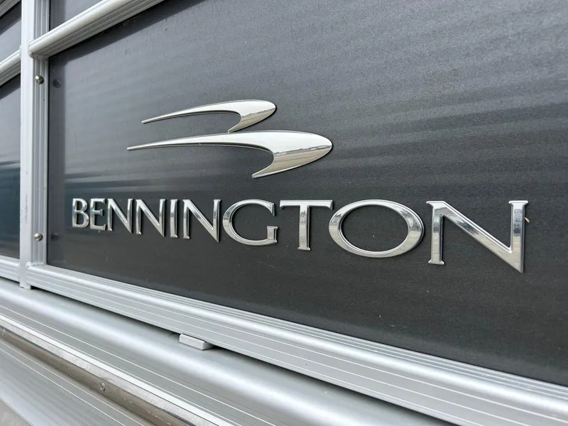 Slide: The Image of 2014 Bennington 2550 RCL logo on a sleek metallic surface. - 4