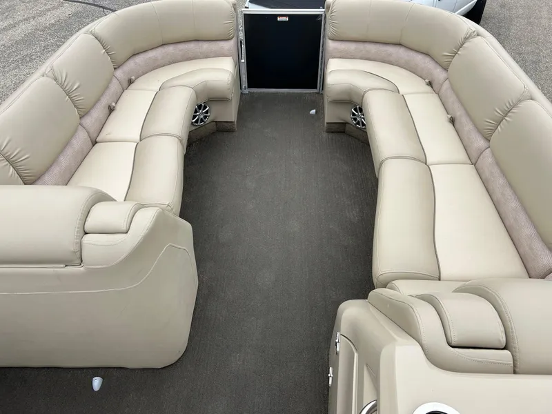 Slide: The Image of 2014 Bennington 2550 RCL pontoon boat with spacious beige seating and modern design. - 47