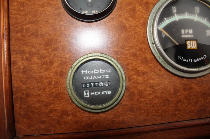 Slide: The Image of Hobbs Quartz hour meter and RPM gauge on 1978 Grand Banks 32 boat dashboard. - 21