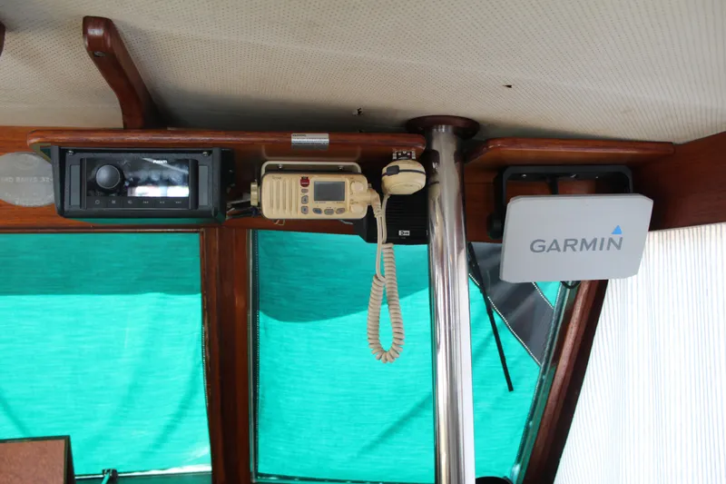 Slide: The Image of Interior of a 1978 Grand Banks 32 boat with Garmin navigation equipment. - 22