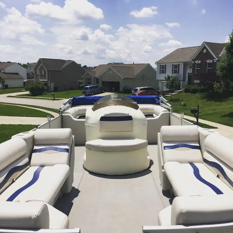Slide: The Image of Pontoon boat parked in suburban neighborhood, Crest Ultra ET model, year 2000. - 8