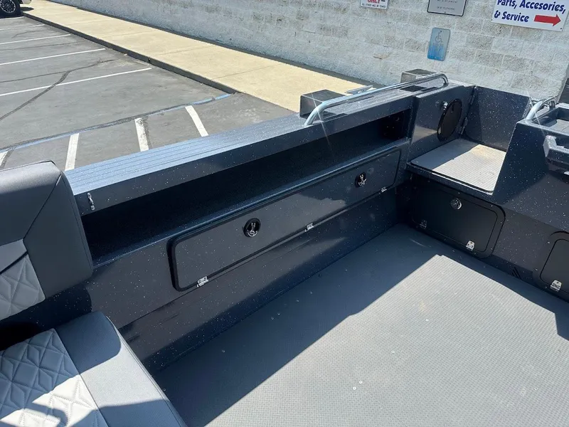 Slide: The Image of 2025 Duckworth 21 Discovery boat interior with seating and storage compartments. - 12