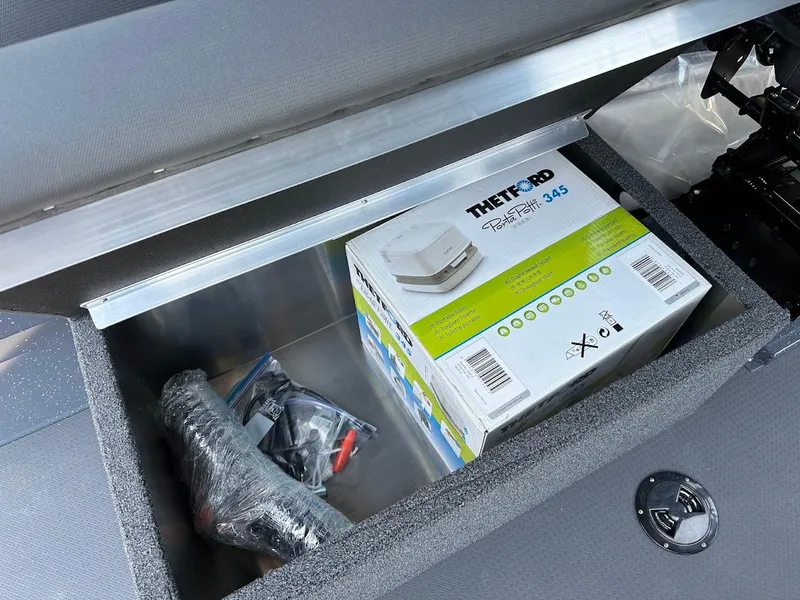 Slide: The Image of Storage compartment in 2025 Duckworth 21 Discovery boat with Thetford product box. - 29