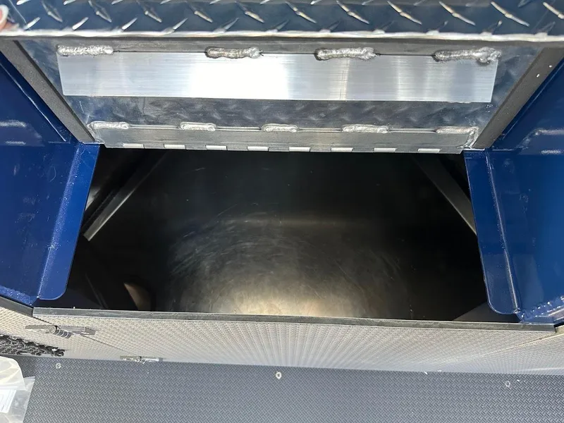 Slide: The Image of Open storage compartment in 2025 Duckworth 21 Discovery boat. - 36