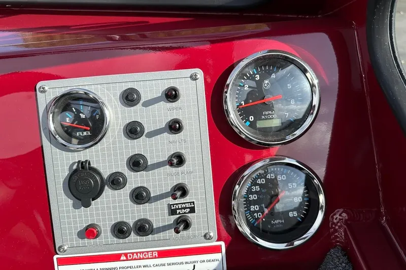 Slide: The Image of Dashboard of 2025 Duckworth 20 Advantage SE boat with gauges and controls. - 22