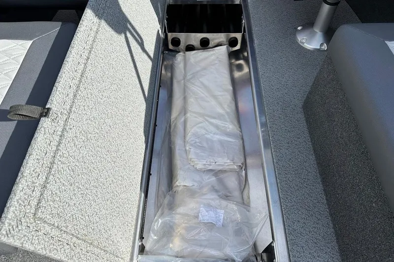 Slide: The Image of Open storage compartment in 2025 Duckworth 20 Advantage SE boat, showing interior details. - 33