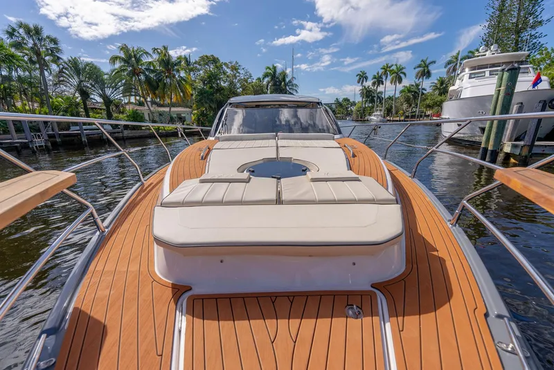 Slide: The Image of Luxurious 2024 Hanover 415 yacht with sleek deck design, docked in a scenic marina. - 25