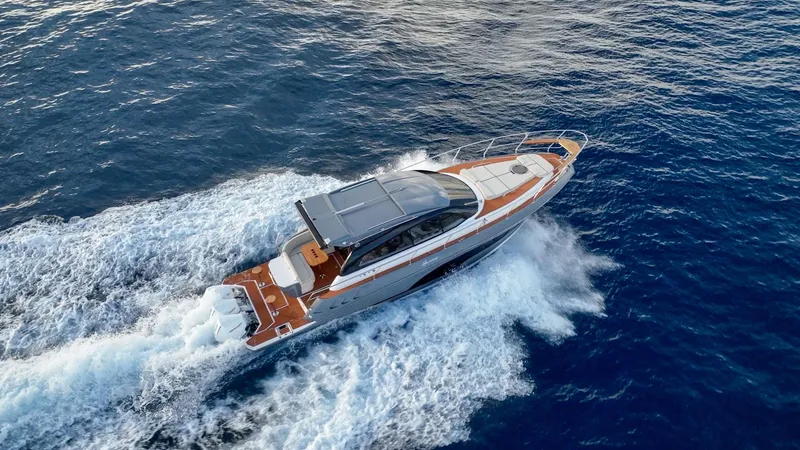 Slide: The Image of 2024 Hanover 415 yacht cruising on open sea, aerial view. - 27
