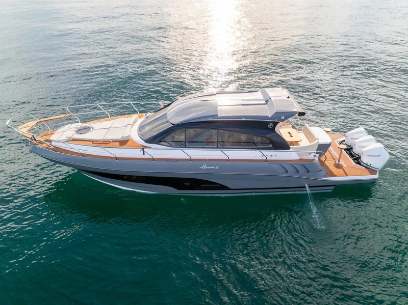 Slide: The Image of 2024 Hanover 415 yacht cruising on calm ocean waters, showcasing sleek design and luxury features. - 3
