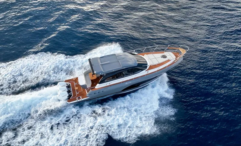 Slide: The Image of 2024 Hanover 415 yacht cruising on open sea, aerial view. - 30