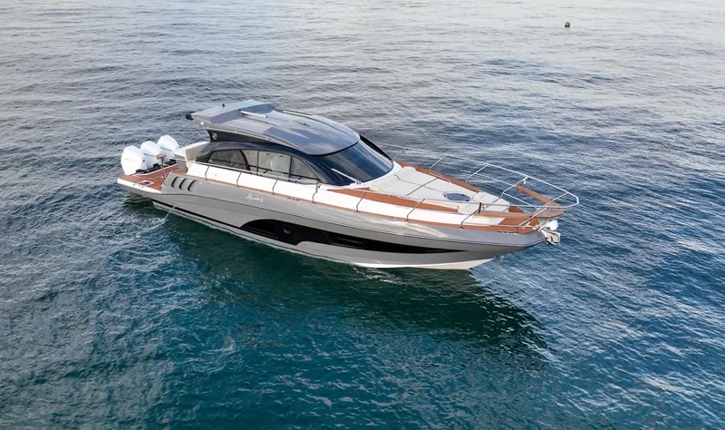 Slide: The Image of 2024 Hanover 415 yacht cruising on open water, showcasing sleek design and modern features. - 32
