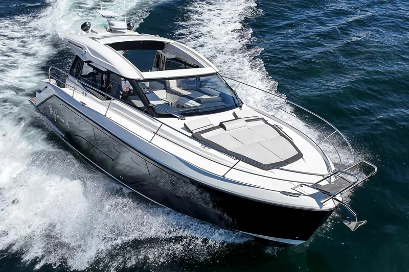 Slide: The Image of 2023 Bavaria SR36 yacht cruising on open water, showcasing sleek design and luxury features. - 21
