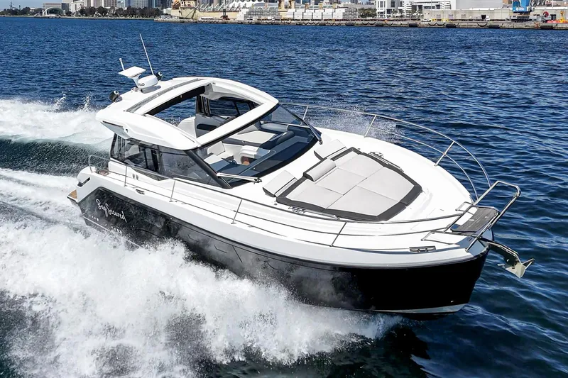 Slide: The Image of 2023 Bavaria SR36 yacht cruising on open water, showcasing sleek design and modern features. - 3