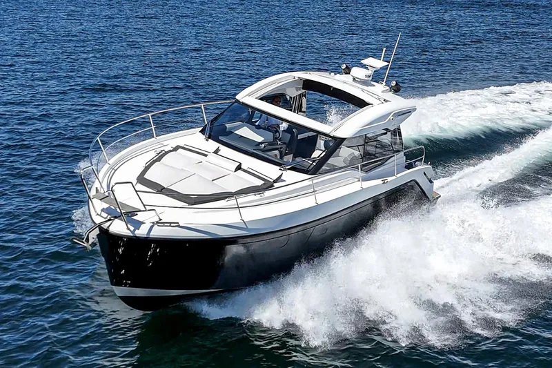 Slide: The Image of 2023 Bavaria SR36 yacht cruising on open water, showcasing sleek design and performance. - 8
