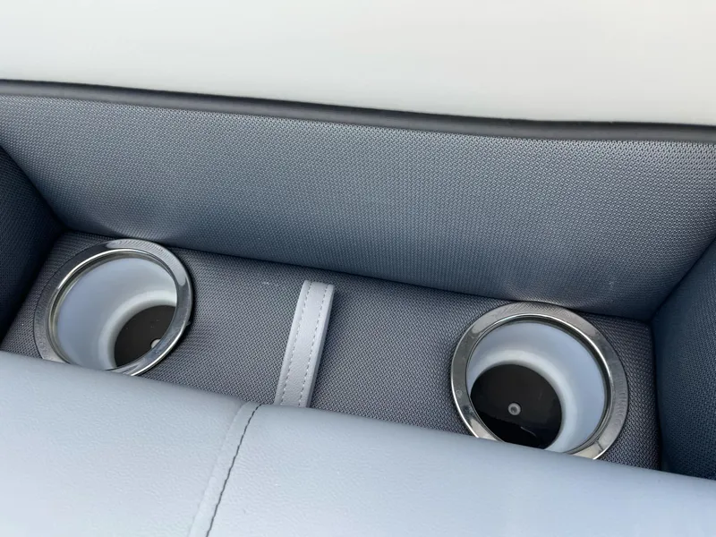 Slide: The Image of 2025 Bentley Pontoons Legacy 243 QSB interior cup holders with sleek design. - 31