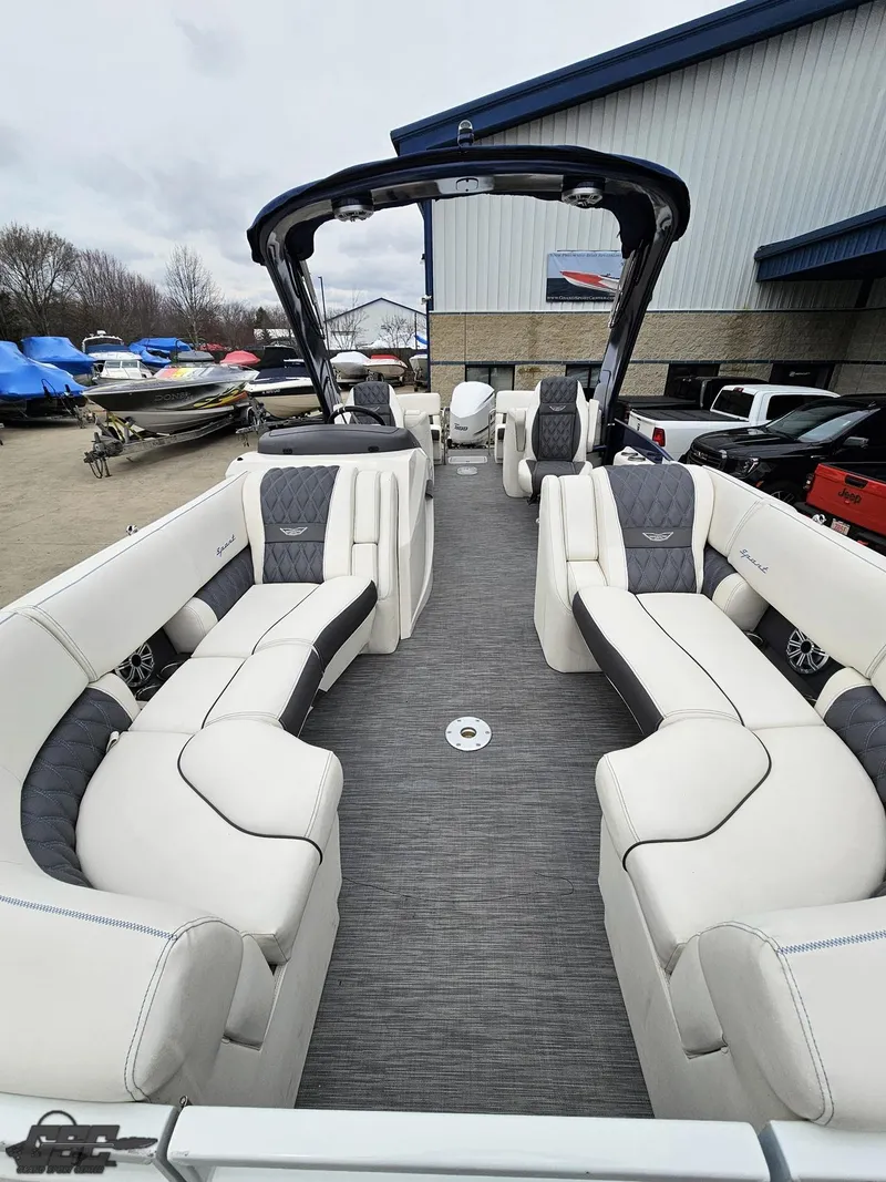 Slide: The Image of 2021 Bennington RX 25 Quad Bench boat with luxurious seating and sleek design. - 15