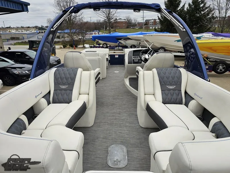 Slide: The Image of 2021 Bennington RX 25 Quad Bench pontoon boat with luxurious seating and modern design. - 35