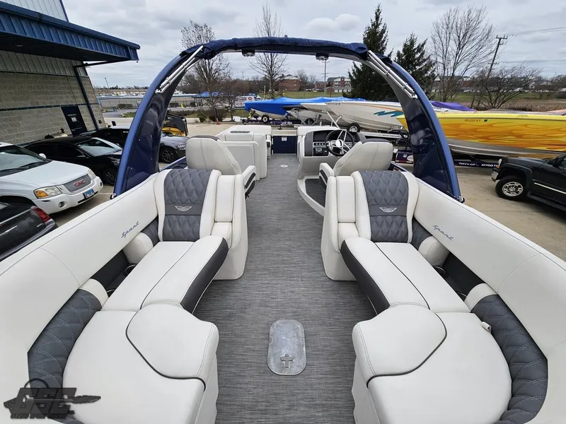 Slide: The Image of 2021 Bennington RX 25 Quad Bench boat with luxurious seating and modern design. - 36