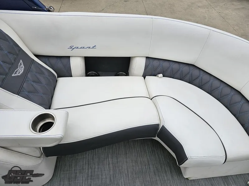 Slide: The Image of 2021 Bennington RX 25 Quad Bench, white and gray seating with cup holder. - 44