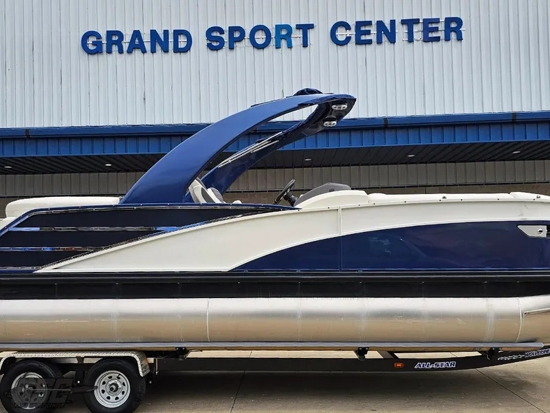 Slide: The Image of 2021 Bennington RX 25 Quad Bench pontoon boat at Grand Sport Center. - 5