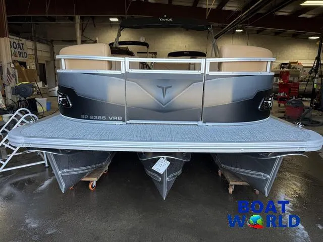 Slide: The Image of 2025 Tahoe Sport 2385 Swingback Tritoon in showroom, rear view. - 31