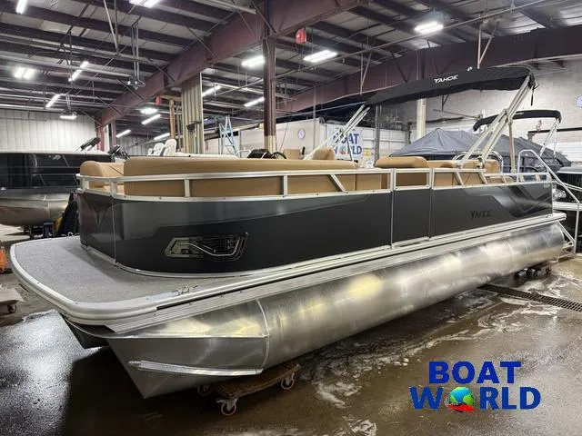 Slide: The Image of 2025 Tahoe Sport 2385 Swingback Tritoon in showroom, featuring sleek design and modern amenities. - 34