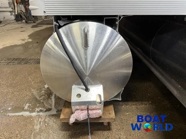 Slide: The Image of 2025 Tahoe Sport 2385 Swingback Tritoon, close-up of pontoon with Honda 4-Stroke engine. - 37