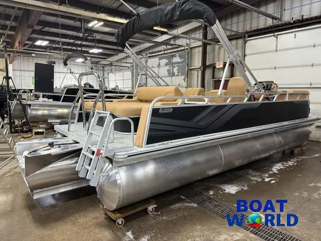 Slide: The Image of 2025 Tahoe Sport 2385 Swingback Tritoon in warehouse, featuring Honda 4-Stroke engine. - 42