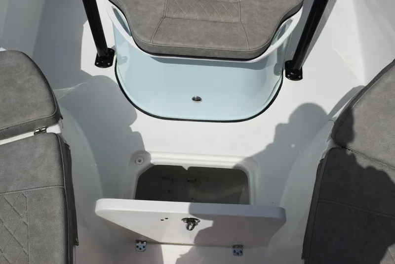 Slide: The Image of 2023 Sea Pro 219 Deep V CC boat interior with open storage compartment. - 18