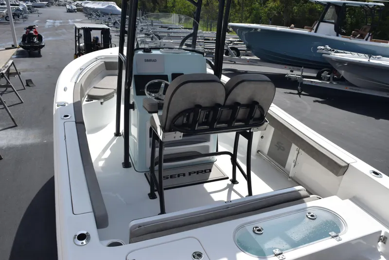 Slide: The Image of 2023 Sea Pro 219 Deep V CC boat with dual seats and center console. - 7