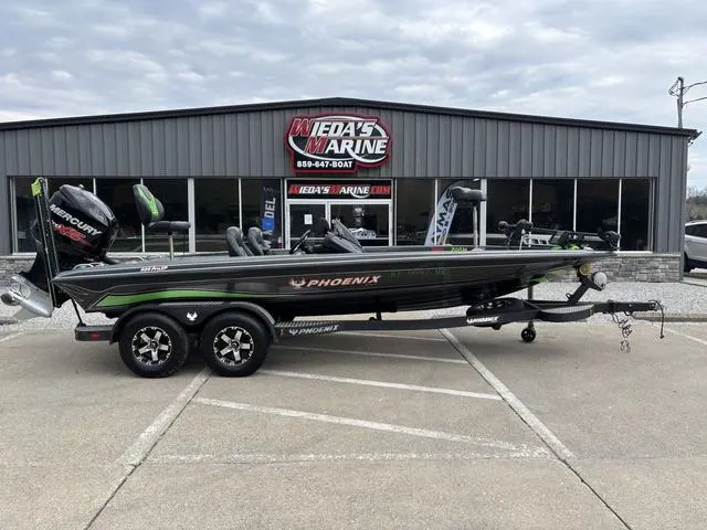 Slide: The Image of 2014 Phoenix Bass Boats 920 ProXP parked outside Wieda's Marine dealership. - 1