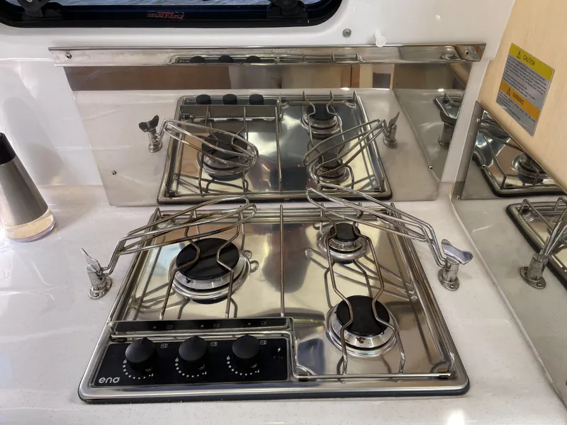 Slide: The Image of Stainless steel stove in 2023 Seawind 1260 yacht kitchen. - 23