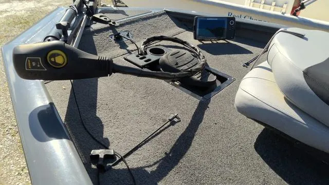 Slide: The Image of 2016 Tracker Pro Team™ 190 TX boat interior with control panel and seating. - 3