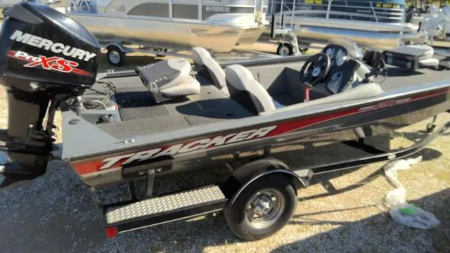 Slide: The Image of 2016 Tracker Pro Team™ 190 TX boat with Mercury engine, parked on a trailer. - 7